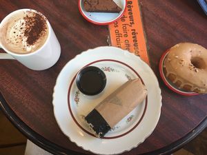 Chocolat chaud, vegan donut and sushi  at Shakespeare and Company Cafe in Paris