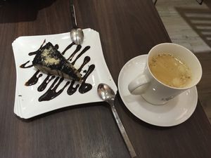 Chocolate cheesecake and black coffee at Tofunia in Taipei