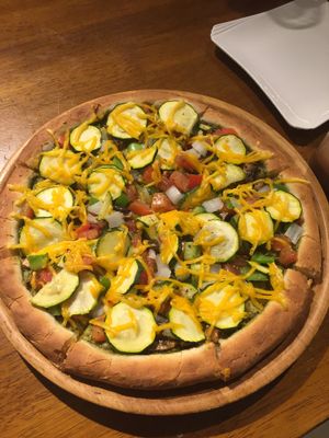 Colourful vegan pizza - good toppings but wasn't as keen on the base  at Tofunia in Taipei