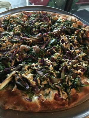 cheeseless pizza with vegan Daiya cheese and drizzled with pesto #superyum!!! at Gourmet Pizza Company in Tampa