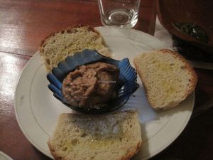 I ordered the ensalada de frijoles and got this bean dip with homemade bread and olive olive. It was very tasty. at La Redaccion in Trinidad