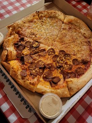 Half cheese half pepperoni at Mikey's Late Night Slice in Columbus