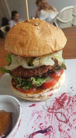 Honest Burger... added caramelized onions. OUT OF THIS WORLD!  at Vibe Cafe in Siem Reap