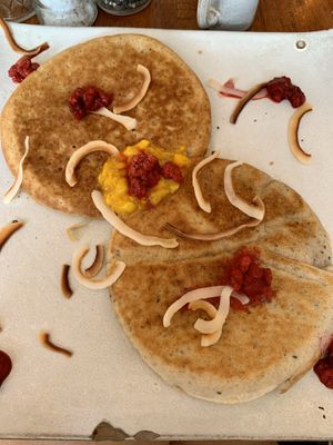 Vegan pancake - they were ok - raw cakes are better!! at Vibe Cafe in Siem Reap