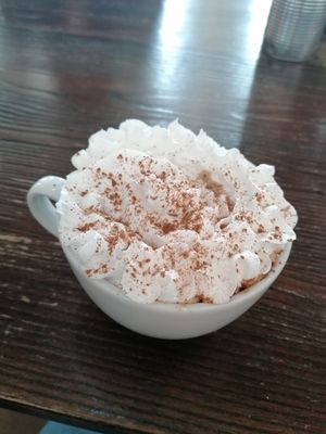 Hot chocolate with vegan whipped cream at Interval Bar in Sheffield