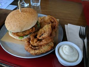 Chicken burger with onion rings and aioli at The Green Lion Pub in Rozelle