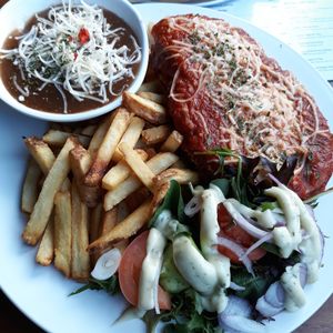 Eggplant parmigiana with loaded poutine fries. at The Green Lion Pub in Rozelle