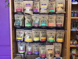 Look at this wall of deliciousness that’s actually GOOD for you too! at Lydia's Health Foods in Petaluma