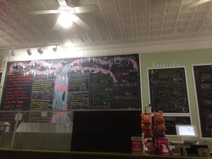 Menu on blackboard  at Tossed on Market in Corning