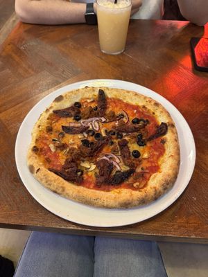 Build your own vegan pizza with olives, mushrooms, red onion, sun-dried tomatoes and vegan nduja  at Pizza Punks in Glasgow