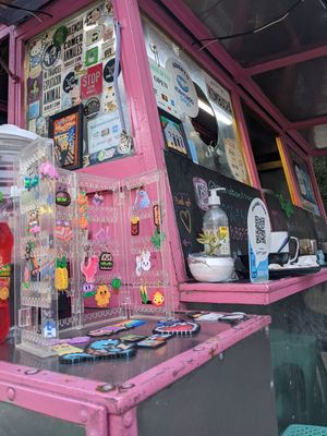 Earnings and keychains for sale at Maria Bonita Veganos - Food Cart in Mexico City