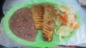 Milanesa de berenjena, acompañada con frijoles y ensalada at Maria Bonita Veganos - Food Cart in Mexico City
