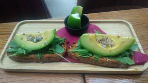 Tostada de rúcula, aguacate y semillas at Carnaval in Javea