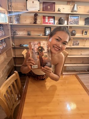This is the owner she’s amazing but her book!   at May Kaidee in New York City