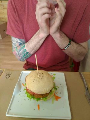 He loved it: the bread, the vegan mayo, the burger... Delicish... at Malaika in Tenerife