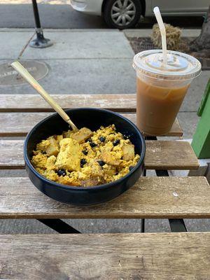 Tofu breakfast burrito bowl and iced coffee!  at Fancy Plants Cafe in Chicago