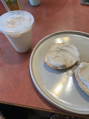 Iced soy chai and bagel with vegan cream cheesee  at Fancy Plants Cafe in Chicago