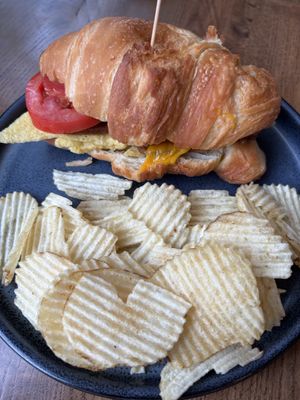 croissant sandwich + veggies! at Fancy Plants Cafe in Chicago
