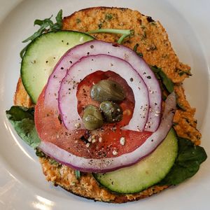 Bagel with herbed sunflower seed spread. at Fancy Plants Cafe in Chicago