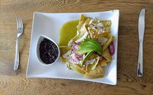 Chilaquiles verdes with black beans at La Raiz de la Tierra in Ixtapa