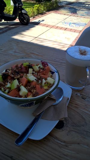 Mango Yogurt with green apple, papaya and granola and chai tea latte at La Raiz de la Tierra in Ixtapa