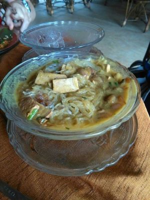coconut,  chickpeas and smoked tofu curry with rice noodles  at Dharma Swasti in Kuilapalayam