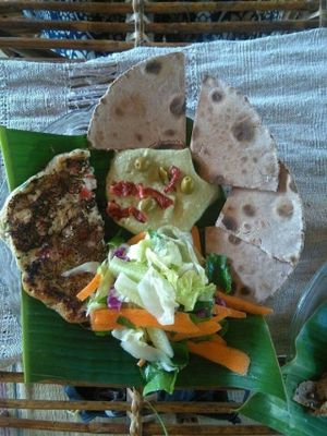 Vegan chickpea omelette with hummus and gluten free bread at Dharma Swasti in Kuilapalayam