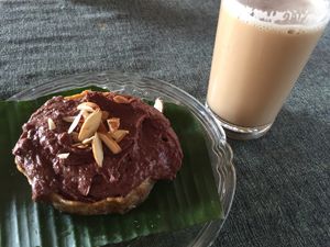 Almond-date-chocolate-cake and masala chai with coconutmilk at Dharma Swasti in Kuilapalayam