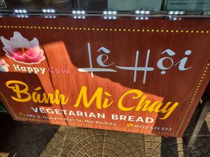 Stand may be covered in tarps when it's hot 🥵 at Hoi Banh My Chay - Food Stall in Hoi An