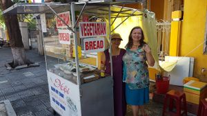Kat and the chay ban mi lady at Hoi Banh My Chay - Food Stall in Hoi An