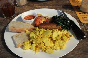 Tofu scramble, sauteed greens ( a little salty, though), bread, baked beans, tomatoes, mushrooms and incredible homemade sausage!   at Cafe Culture in Koh Tao