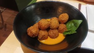 Coralinas ... Albóndigas de lentejas rojas y quinoa at La Huella Vegana in Alcala De Henares