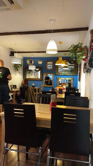 Dining area at La Huella Vegana in Alcala De Henares