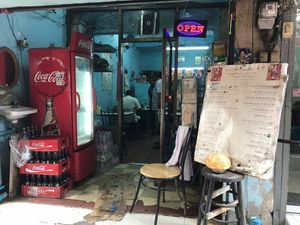 In front of the store.  at Indian Food Shop in Bangkok