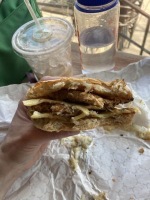 Vegan breakfast sammie w added sausage. Tasty iced almond milk chai too 😋  at The Gold Standard Cafe in Philadelphia