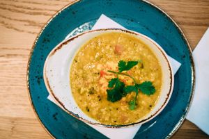 Indian Dal Soup with Hot Sauce. at Mom's Table  in Augsburg