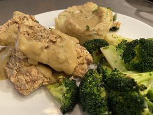 child fingers, mashed potatoes and gravy, and broccoli  at The Beer Plant in Austin