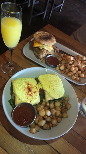 Avocado egg Benedict and honey butter chicken sandwich  at The Beer Plant in Austin