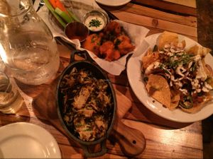 cauliflower wings, loaded nachos and shredded brussel sprouts  at The Beer Plant in Austin