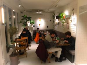 Cosy corner with tables at SLA - Kruisweg in Haarlem