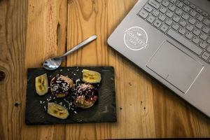 Foodprintz-made banana and date ice cream with warm berry sauce at Foodprintz Cafe in Lisbon