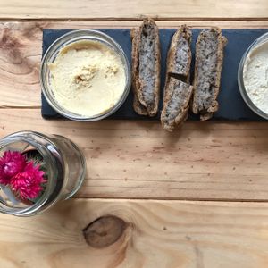 ";yogi plate"; ~ gluten free homemade bread with hummus and vegan ricotta! amazing! at Foodprintz Cafe in Lisbon