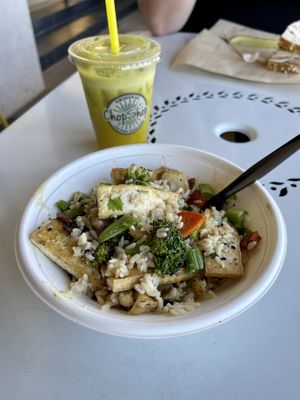 The Daily Detox (golden beet, apple, ginger, lemon, orange, parsley, and aloe vera) to drink and the Green Curry Tofu to much on. So good!   at Original ChopShop in Chandler