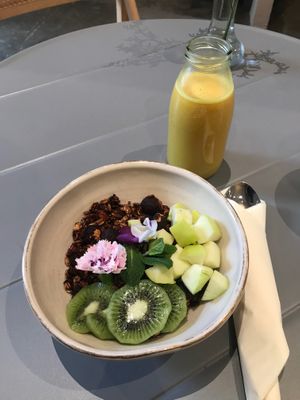 granola bowl with golden milk at Raw Nest in Krakow