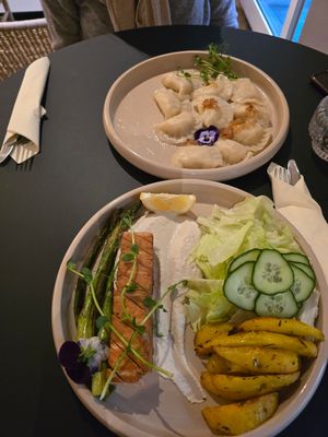 Potato smoked -tofu dumplings 😋  and smoked "salmon" with potatoes and cashew cheese at Raw Nest in Krakow