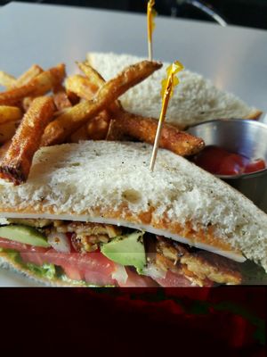 Spicy Tempeh Sandwich with Cajun Fries at Green House Cafe in Fargo