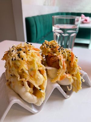 Po' Boy Bun ($8 each) - crispy cauliflower, sriracha aioli, sesame seed, cole slaw, crispy shallots at Ladybird in New York City