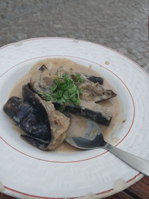 Aubergine in spicy peanut sauce at A Venda in Faro