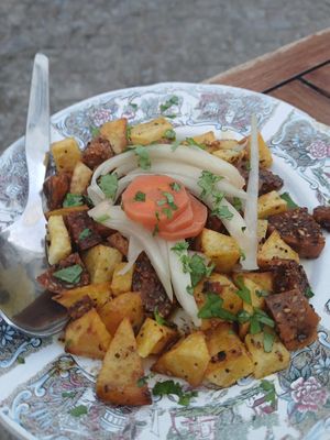 Fried flax bread & potatoes at A Venda in Faro
