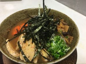 Miso Ramen , kombu/Shiitake dashi , tempeh, carrot, bamboo shoots, shiitake musroom, alkaline wheat noodles , scallions & sichimi  at Zen Cuisine in Durango